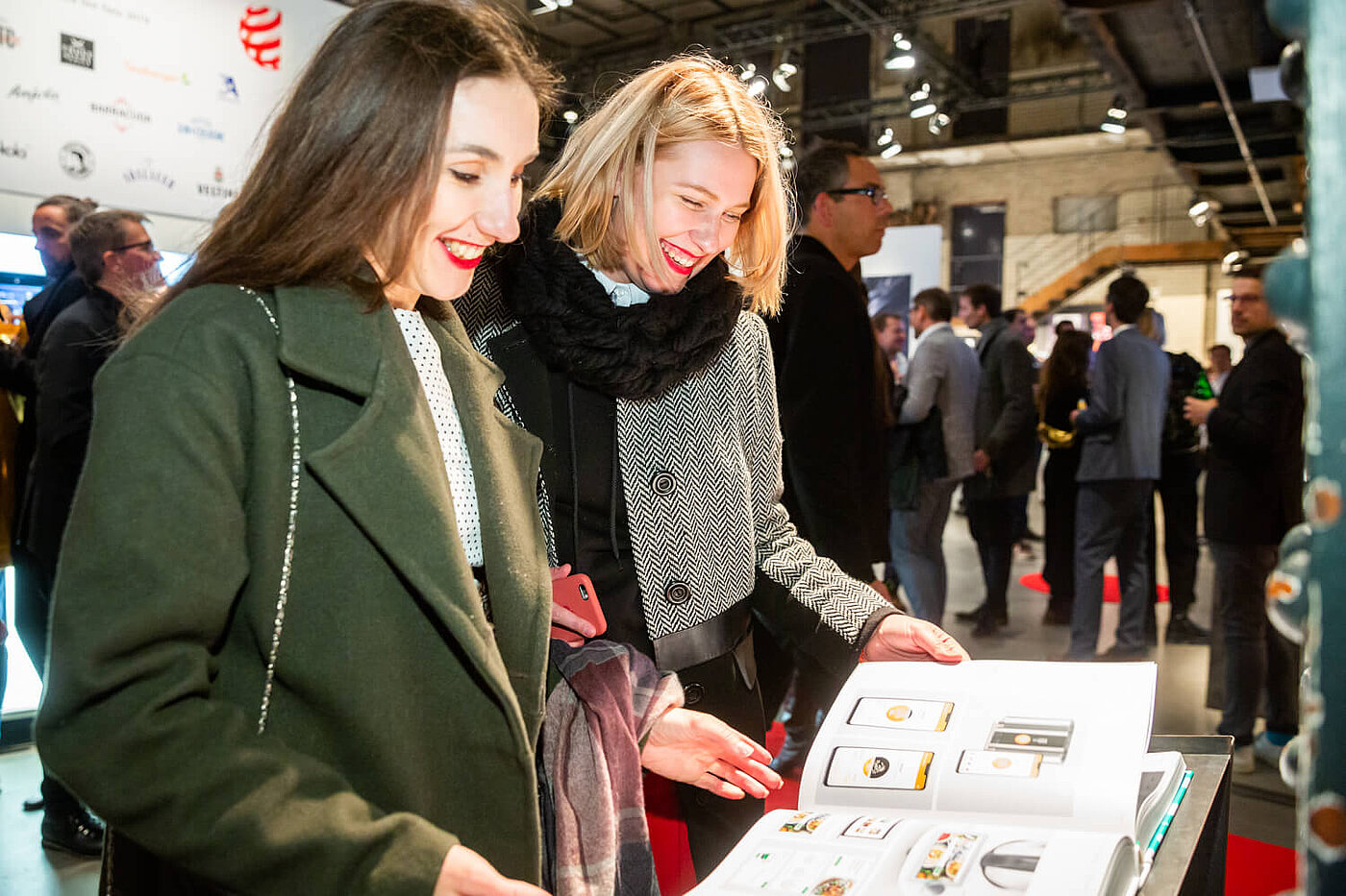 Guests leaf through the yearbook at the award ceremony